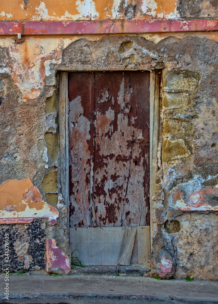 Naklejka premium Old door with wood and metal