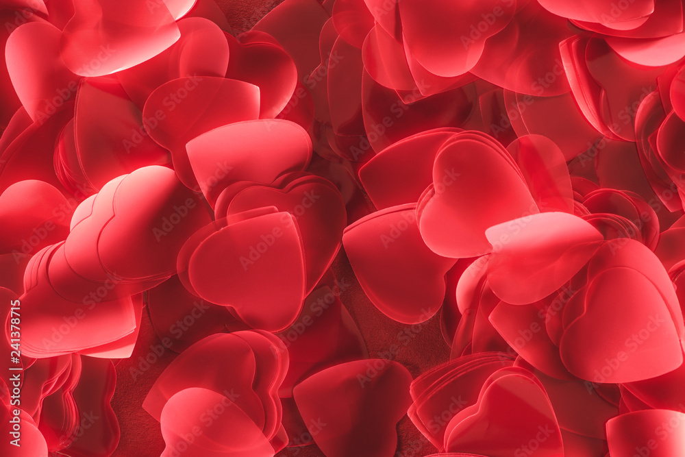 close-up view of decorative red heart shaped petals, valentines day background close-up view of decorative red heart shaped petals, valentines day background