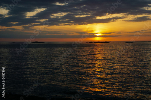 Colorful beautiful sunset at Atlantic Ocean in Norway