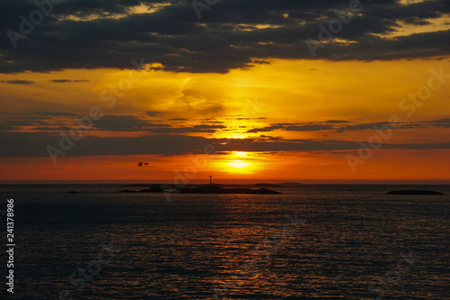 Colorful beautiful sunset at Atlantic Ocean in Norway © irmoske