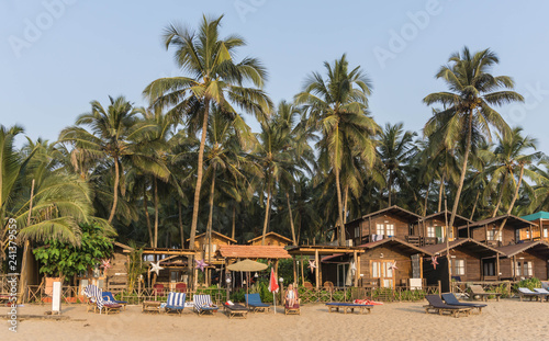 Beachfront huts along Agonda Beach in Southern Goa, India