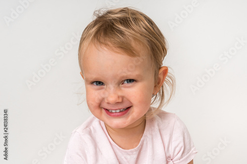 Beautiful smiling baby on isolated background