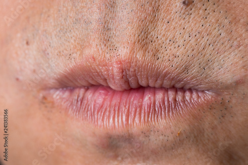 Closeup macro portrait of Man red lip, Human male open close mouth. Body Part of shaved Mustache 40s age