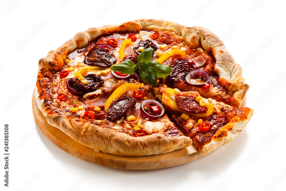 Pizza with ham, corn, mushrooms and dried tomatoes on white background