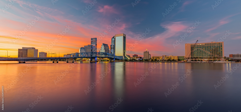 Skyline of Jacksonville, FL and Main Street Bridge at Dusk Skyline of Jacksonville, FL and Main Street Bridge at Dusk