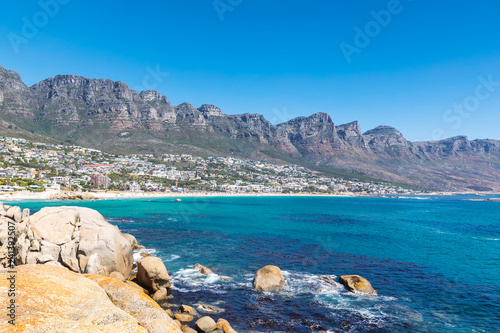 View Camps bay beautiful beach with turquoise water and mountains in Cape Town, South Africa