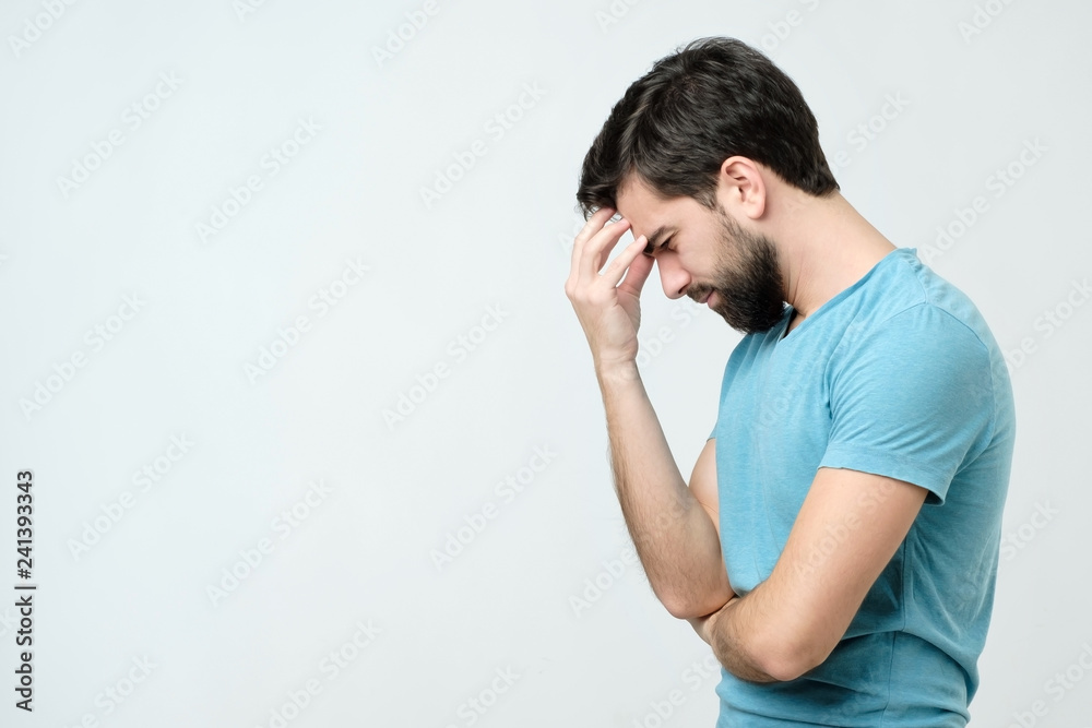 Side view young handsome spanish man thinking Side view young handsome spanish man thinking