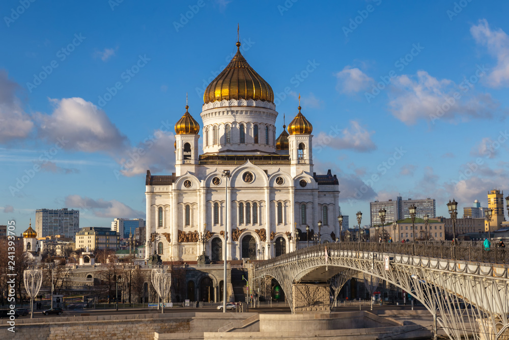 View of Cathedral of Christ the Saviour in Moscow with bridge over Moskva river on a sunny day