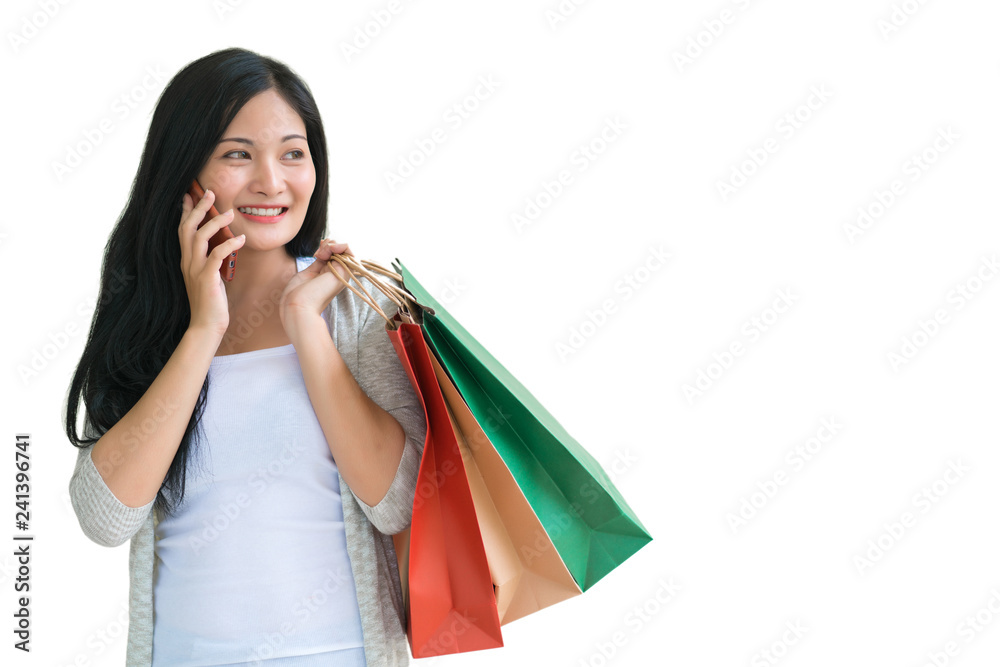 Shopping woman holding bags isolated on white background, consumerism, sale and people concept Shopping woman holding bags isolated on white background, consumerism, sale and people concept