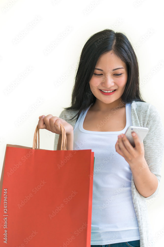 Shopping woman holding bags isolated on white background, consumerism, sale and people concept. Shopping woman holding bags isolated on white background, consumerism, sale and people concept.
