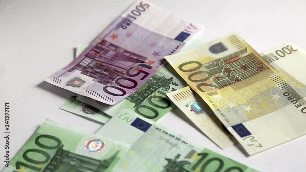 Euro bills flying onto white background, full HD 1080p video footage 25 fps Euro bills flying onto white background, full HD 1080p video footage 25 fps