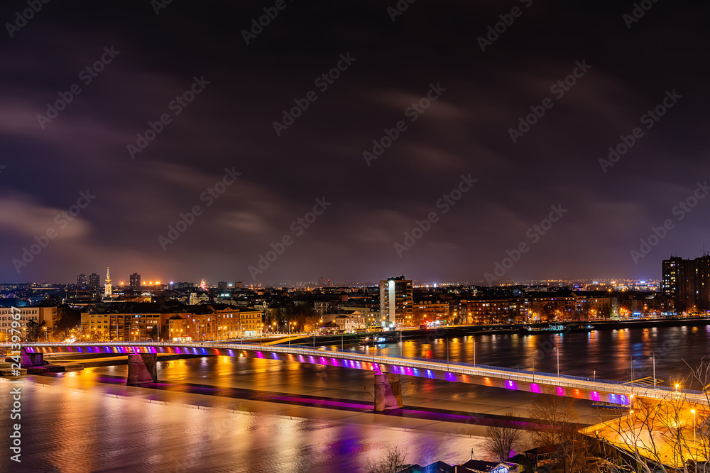 Novi Sad, Serbia - January 01, 2019: Panorama of Novi Sad and Danube river at night
