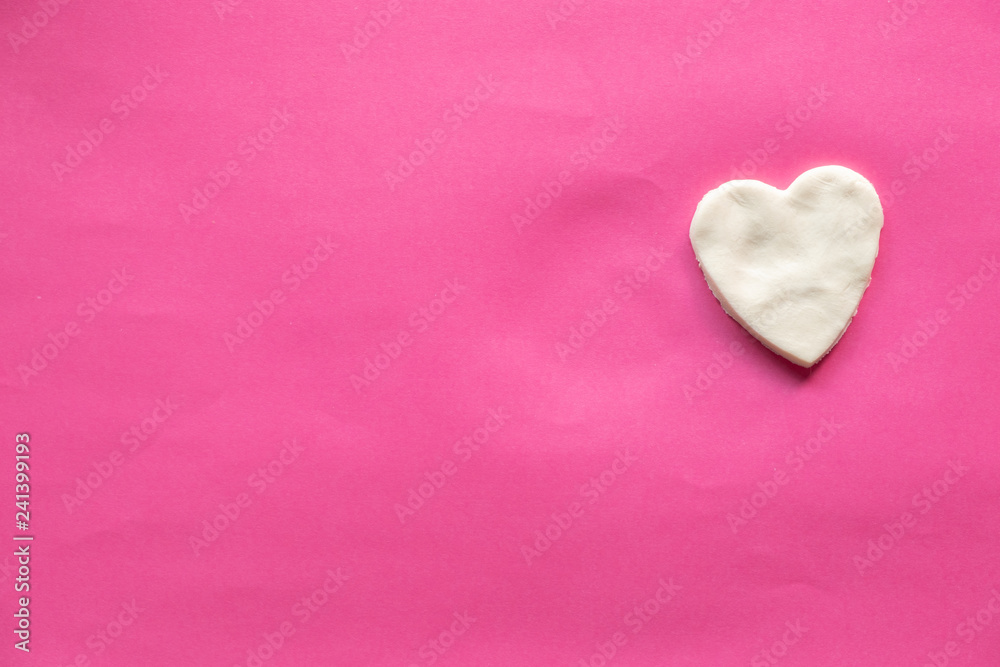Fototapeta premium shape of heart, White heart on pink background, Love icon, valentine's day, relationships concept with copy space