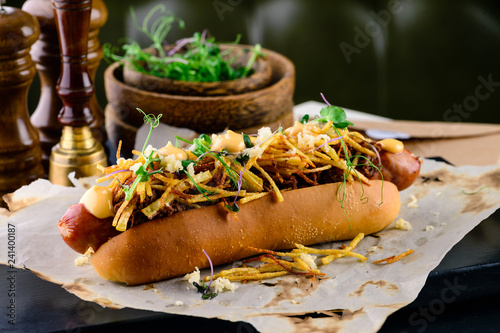 Obraz na plátne Delicious grilled hotdog in a restaurant