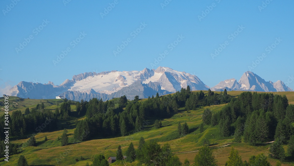 Landscape to the Marmolada and its glaciers during the summer Landscape to the Marmolada and its glaciers during the summer
