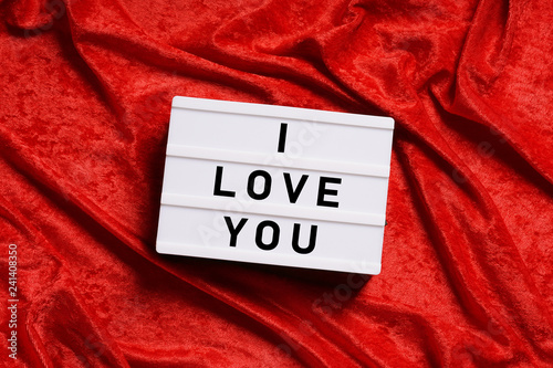 I love you text on lightbox or light box sign on red velvet background