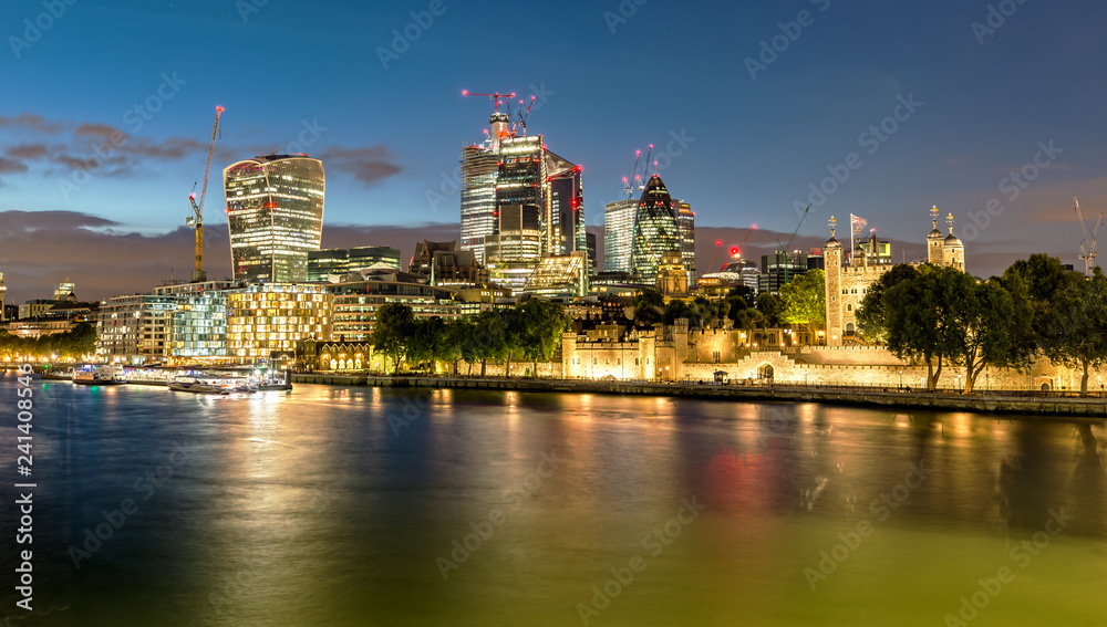 The Modern Skyline of London and the Tower at Night