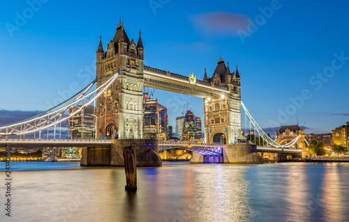 The Tower Bridge in London lights up in the Evening