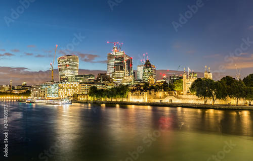 The Modern Skyline of London and the Tower at Night