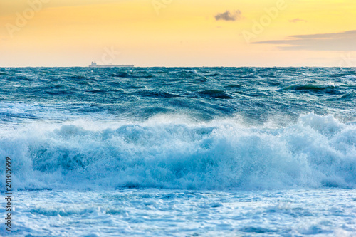 Fototapeta Naklejka Na Ścianę i Meble -  in a storm, the waves hit the shore in Gelendzhik