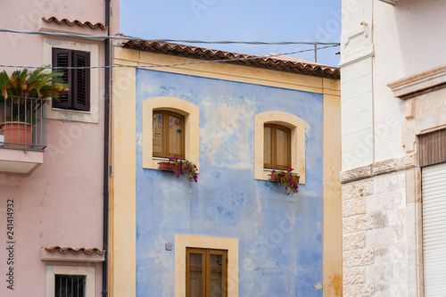 Travel to Italy -  historical street of Acitrezza  Catania  Sicily  facade of ancient buildings.