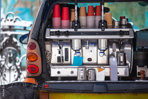 car with coffee machine in the street