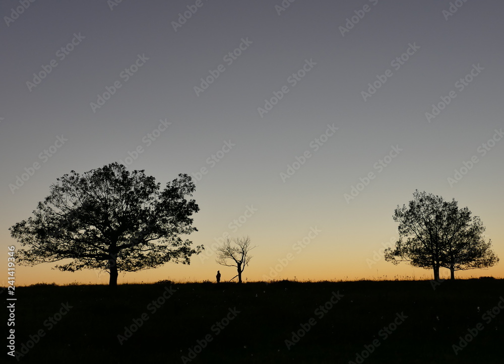 Sunset in Shenandoah with silhouette of a human figure Sunset in Shenandoah with silhouette of a human figure
