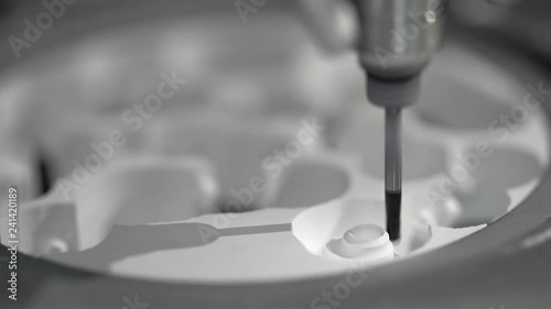 Closeup view at carving process in dental milling machine