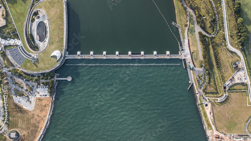 Aerial view of dam in singapore. Where fesh water vs. brine / Save fresh water / Construction Technology / Emgineering Design photo