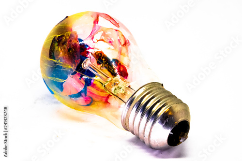 lightbulb in paint of different colors