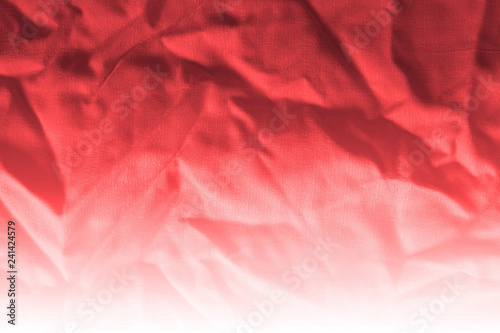 Elegant red textile background. Silk cloth texture. Fabric pattern.