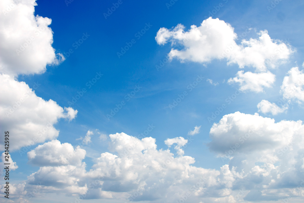 Obraz premium Blue sky background with white clouds