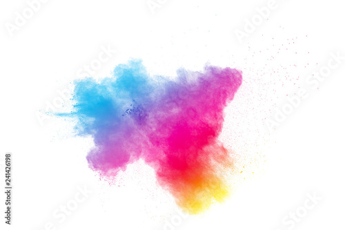 Abstract color powder explosion on white background.Freeze motion of dust splash. Painted Holi in festival.