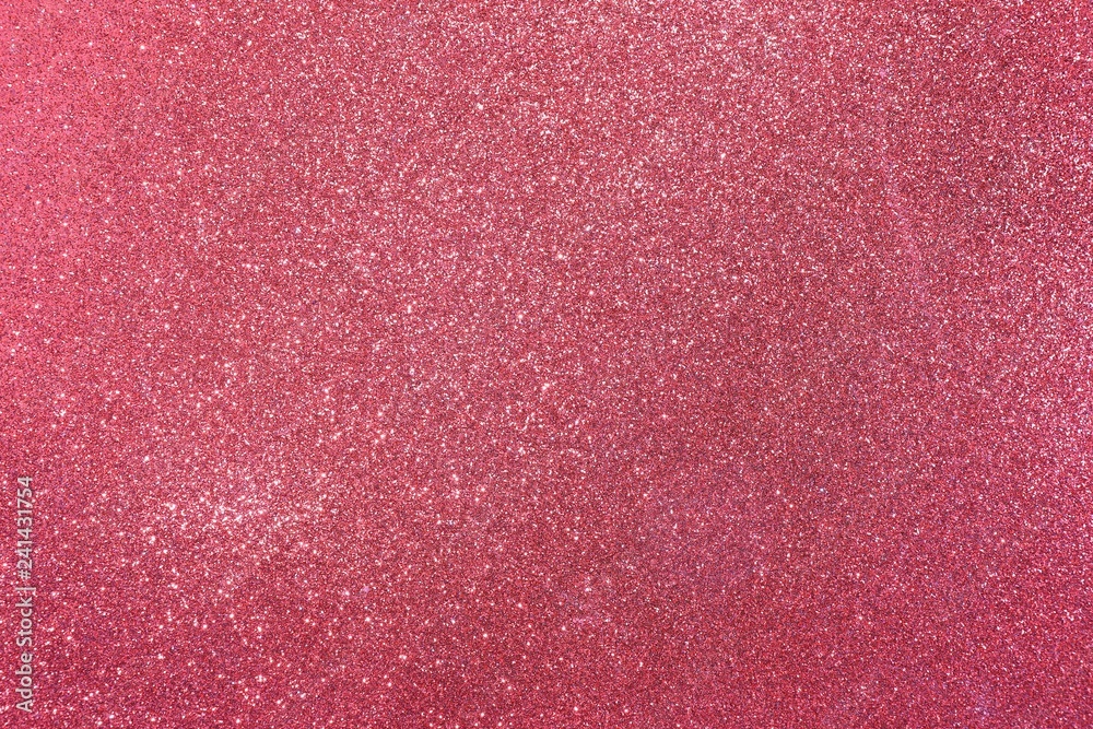 Fototapeta premium red background with plenty of glittering luminous glitterati gli