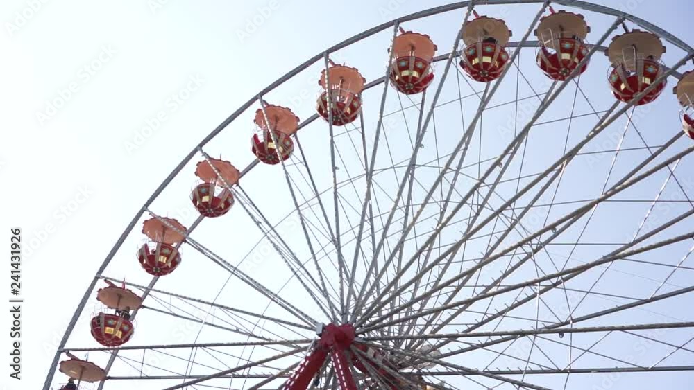 ferry wheel with red cabins and blue sky video ferry wheel with red cabins and blue sky video