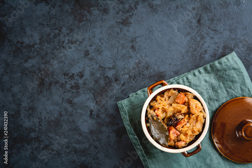 Bigos-traditional Polish dish of finely chopped sauerkraut and fresh cabbage with meat, mushrooms, and sausage. The dish is also traditional for Belarusian, Ukrainian and Lithuanian cuisine. photo