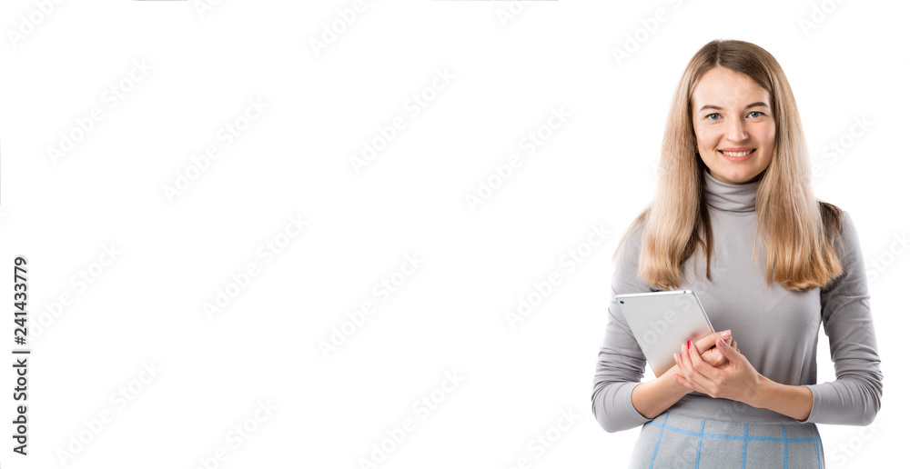 Theme business woman technology. Beautiful young caucasian blond woman in gray dress posing standing with tablet hands on white isolate background. Profession Marketer Sales Social Media Advertising Theme business woman technology. Beautiful young caucasian blond woman in gray dress posing standing with tablet hands on white isolate background. Profession Marketer Sales Social Media Advertising