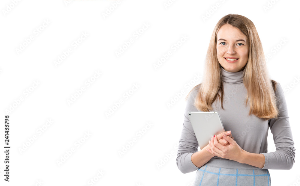 Theme business woman technology. Beautiful young caucasian blond woman in gray dress posing standing with tablet hands on white isolate background. Profession Marketer Sales Social Media Advertising Theme business woman technology. Beautiful young caucasian blond woman in gray dress posing standing with tablet hands on white isolate background. Profession Marketer Sales Social Media Advertising