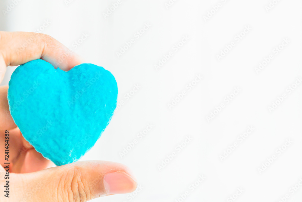 man holding hands  heart on white background