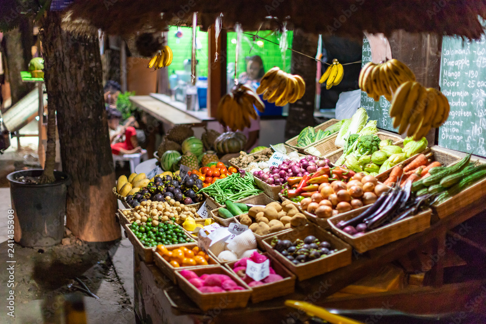 Asian local night market with fruits in Bohol, Philippines.