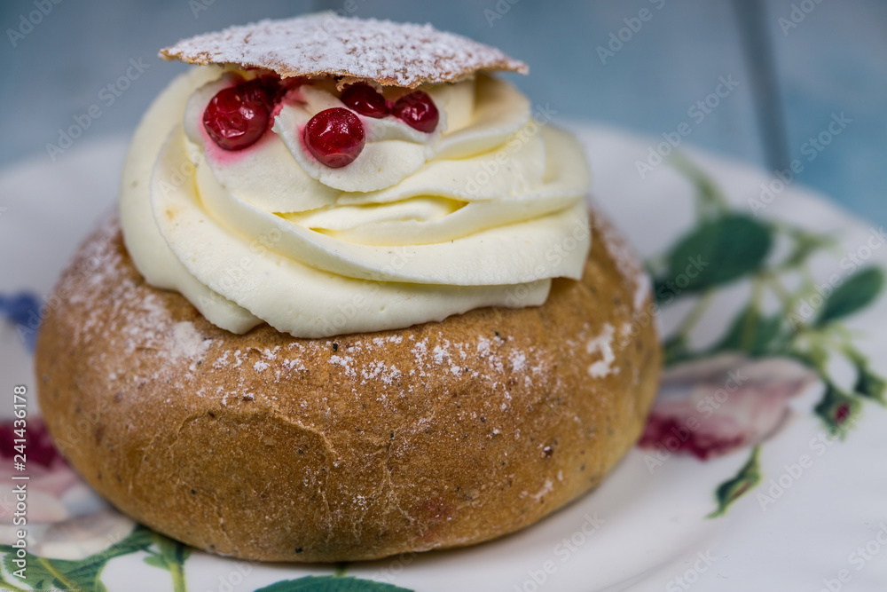 Semla Cake with Cranberrys on Saucer