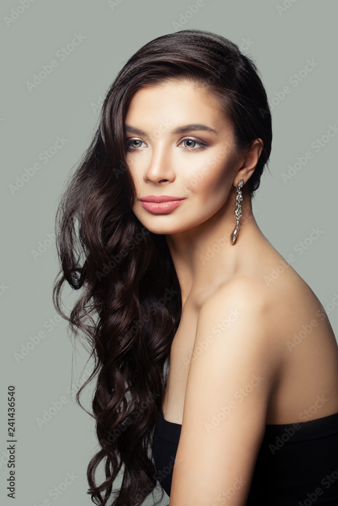 Fototapeta premium Pretty woman with long brown hair portrait