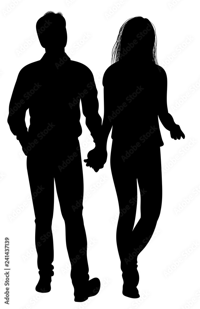 Silhouette of guy and girl going hand in hand