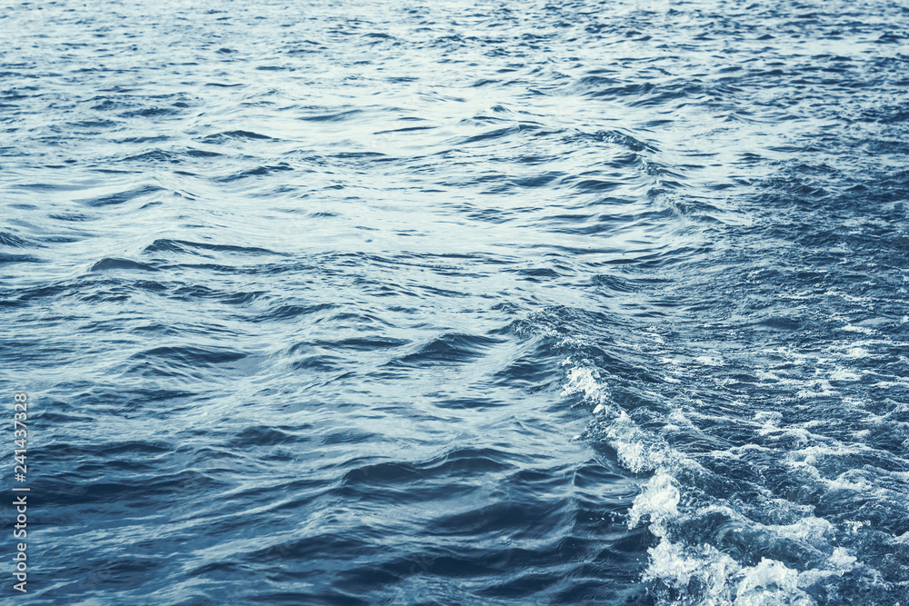 Detail of wavy deep sea water in tension before the storm Detail of wavy deep sea water in tension before the storm