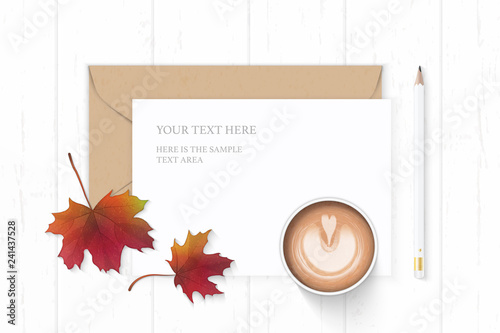 Flat lay top view elegant white composition letter paper kraft envelope autumn maple leaf coffee and pencil on wooden background