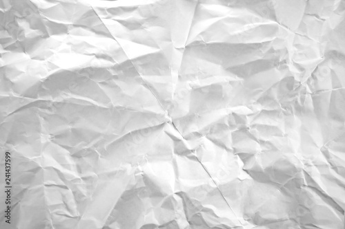 Crumpled white paper as background