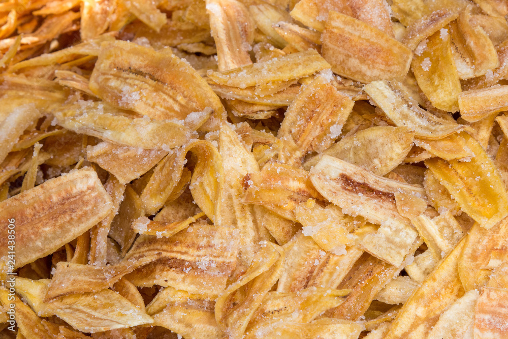 Thai banana chips are made from raw banana. Thai banana chips are made from raw banana.