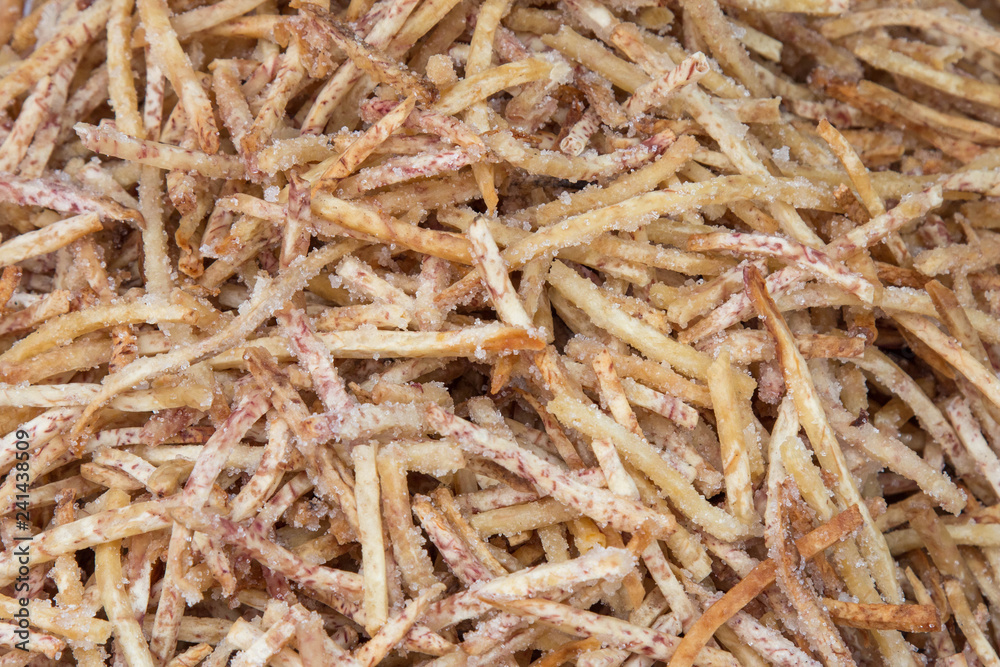Fried taro crisps stick, thai snack. Fried taro crisps stick, thai snack.
