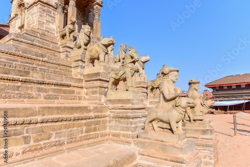 Ancient Stone Guardian Statues of Siddhi Lakshmi Temple in Bhaktapur Durbur Square photo