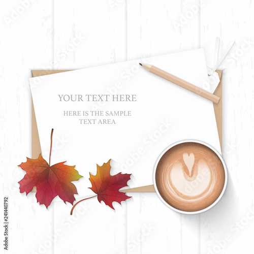 Flat lay top view elegant white composition paper kraft envelope pencil tag autumn maple leaf and coffee on wooden background